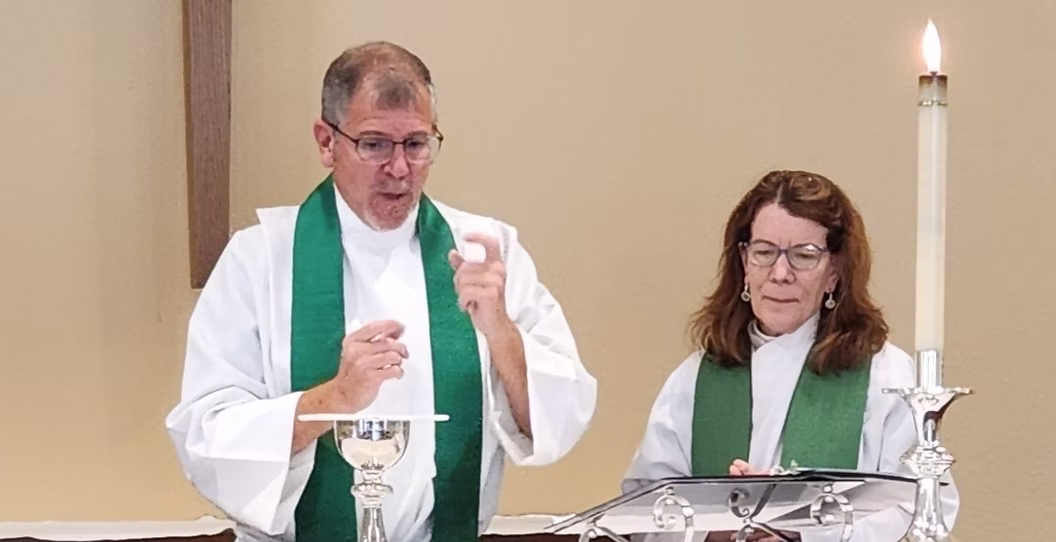 Two Episcopal preachers signing